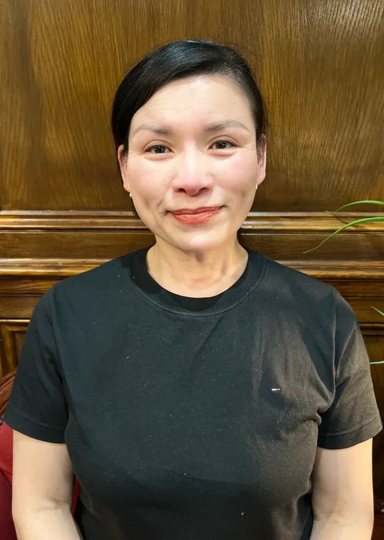 Lin, Massage Therapist at the Boardroom