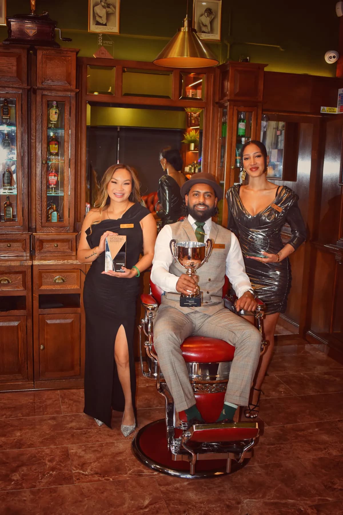 Boardroom staff with their industry trophies