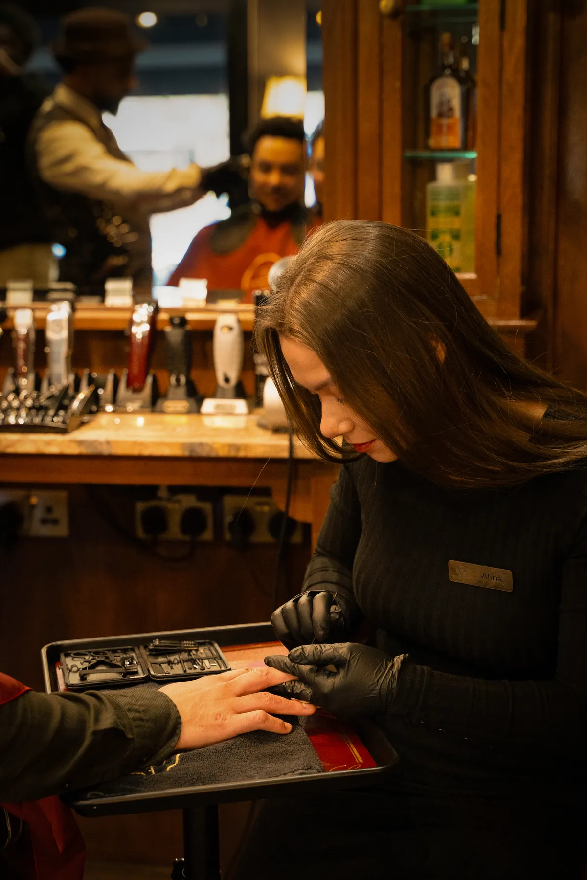 A manicure underway at the Boardroom
